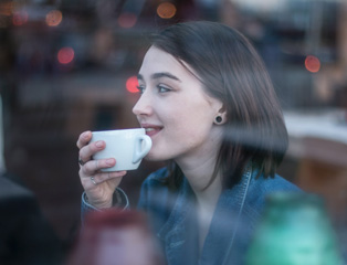 Women drinking a cup of coffee
