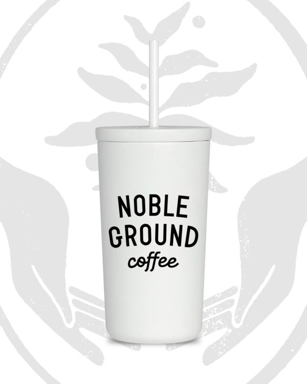 White cup with Noble Ground Coffee logo